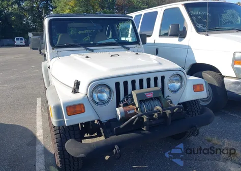 2002 Jeep Wrangler X from USA, damaged, VIN 1J4FA39S32P776088